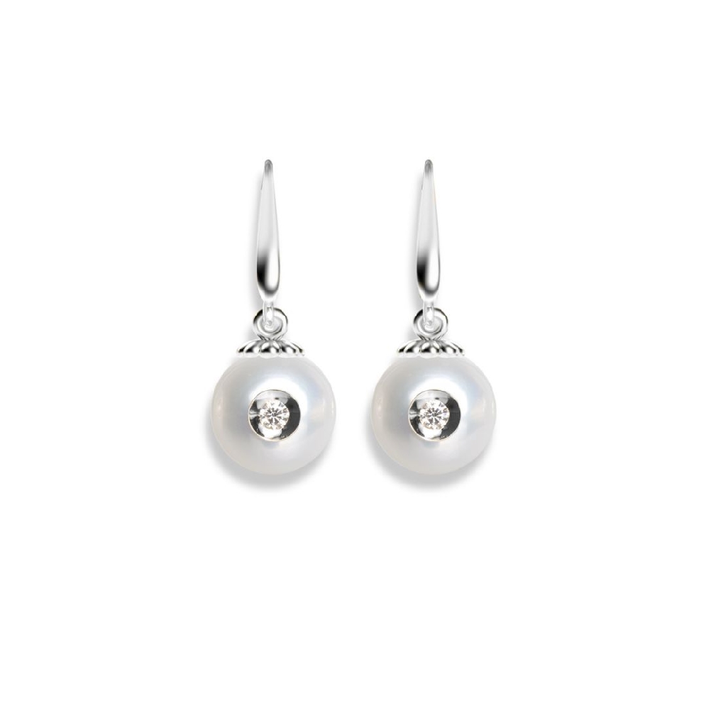 Galatea Hand-Carved Freshwater Pearl Earrings
...