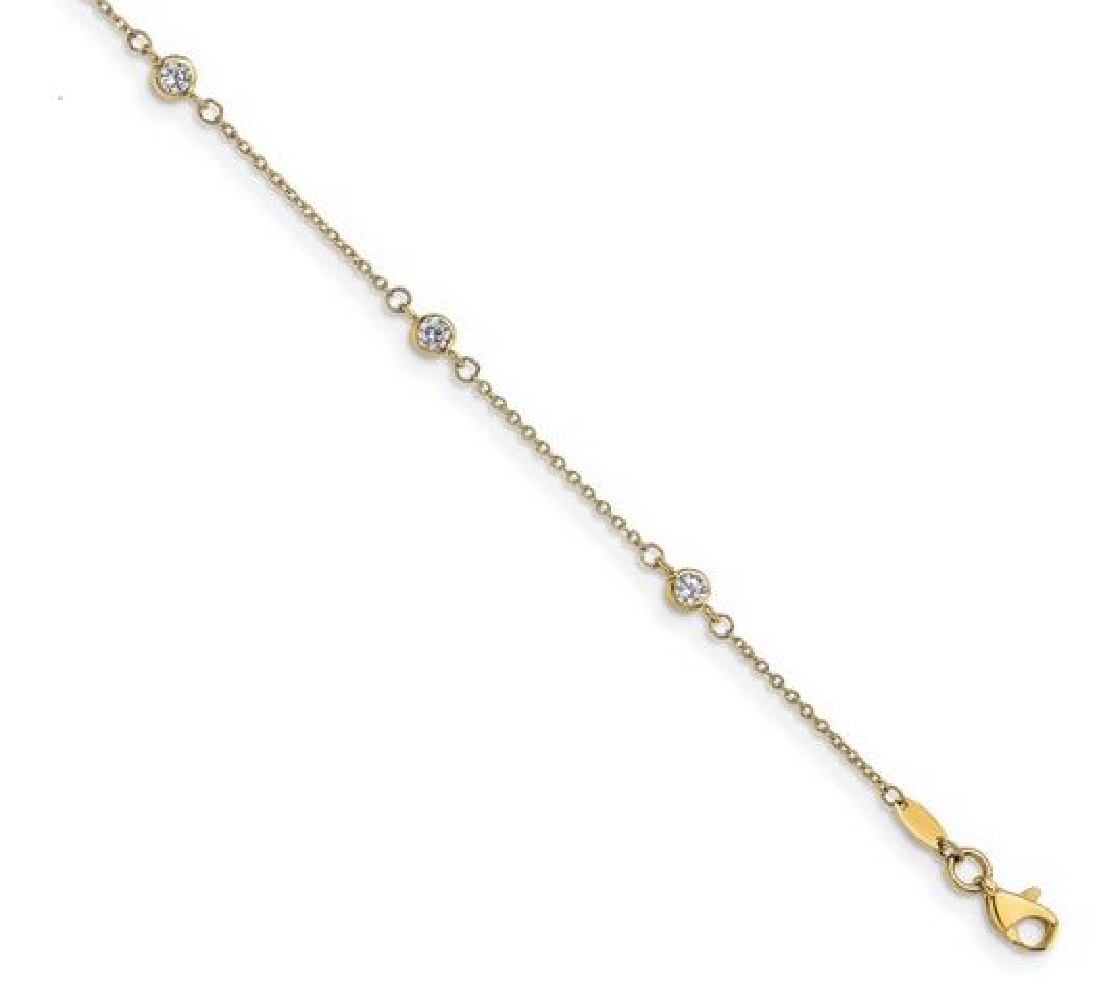 Leslie s  
CZ Station Anklet
10Kt Yellow Gold...